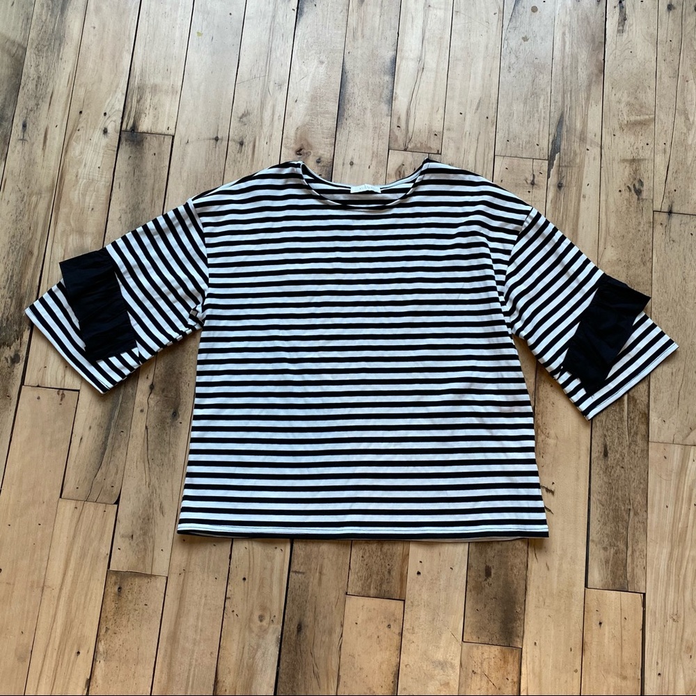 All Row black and white stripped Ruffle tee